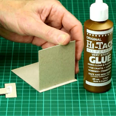 Bottles of PVA glue on a cutting mat